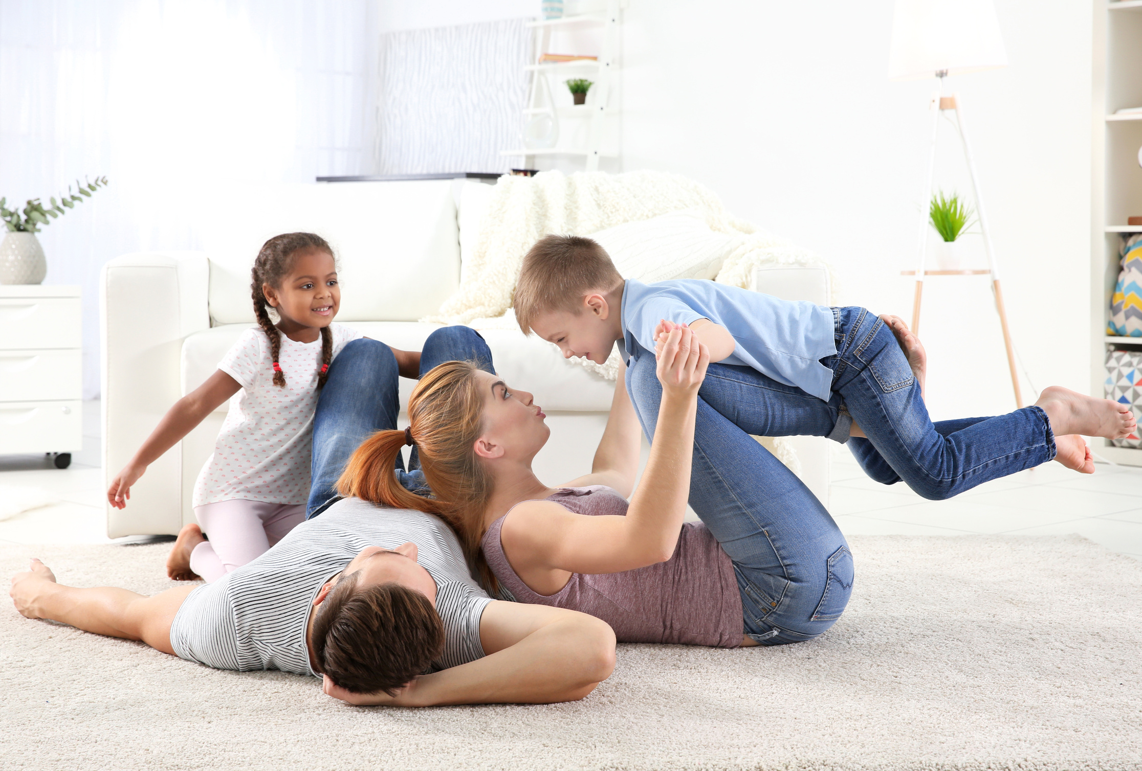 Family Playing on Floor at Home